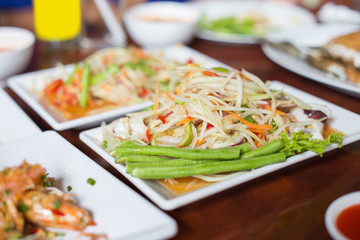 Thai spicy food, Papaya salad isolate on white background.