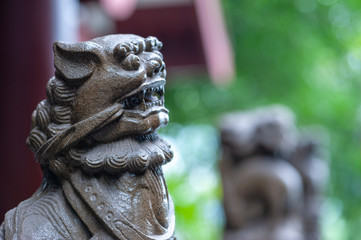 Lion stone statue in a buddhist temple, Chongqing, China