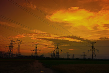 Electric tower, silhouette at sunset