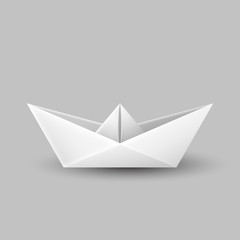 Origami paper boat, ship isolated on gray background 
