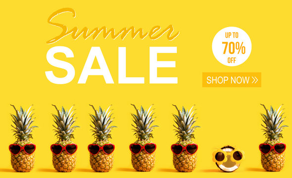 Summer Sale with pineapples and a coconut wearing sunglasses