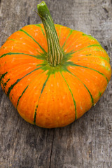 Pumpkin on rustic wooden table