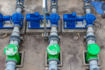 Top view of pump and steel pipelines for cooling tower at industry zone