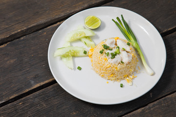 Fried rice with Crab on the wooden table from top view