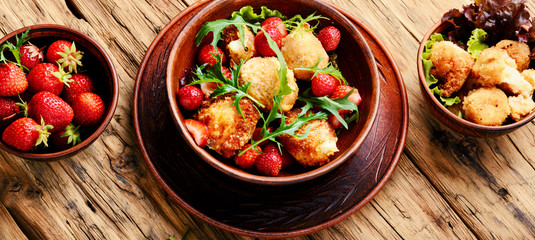 Salad with strawberry and fried cheese