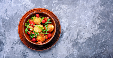 Salad with strawberry and fried cheese