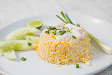 Fried rice with Crab on the wooden table from top view
