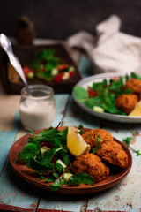  Beet falafel with tahina sauce and green salad