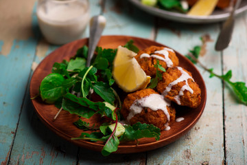  Beet falafel with tahina sauce and green salad