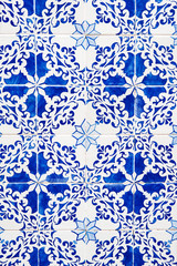 Detail of the traditional tiles from facade of old house