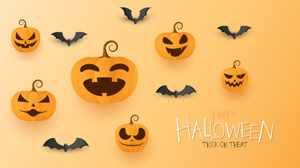 Happy Halloween pumpkins with paper bats.