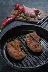 Grilled pork steak on pan