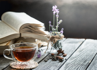 a cup of tea with a book in the interior