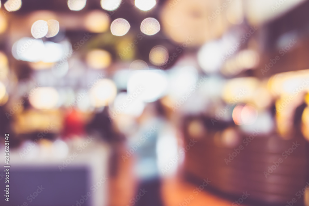 Poster blurred background of customer dining at cafe restaurant blur background with bokeh light.leisure li