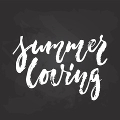 Summer loving - hand drawn seasons holiday lettering phrase isolated on the black chalkboard background. Fun brush ink vector illustration for banners, greeting card, poster design.