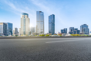 Fototapeta na wymiar Air highway asphalt road and office building of commercial building in modern city