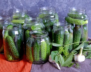 Prepared fresh cucumbers in canning jar 