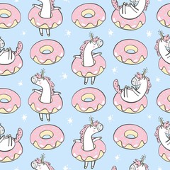 Vector seamless pattern with cute unicorn and donuts