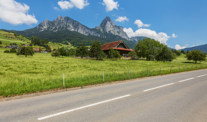 A summertime view in the Swiss canton of Schwyz, the Kleiner Mythen and the Grosser Mythen summits...