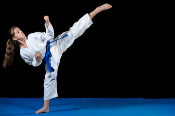 young girl in a white kimono, karate © FS-Stock