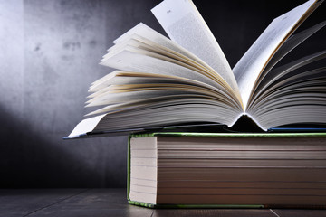 Composition with open book on the table