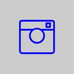 Photo machine icon of blue color on a gray background