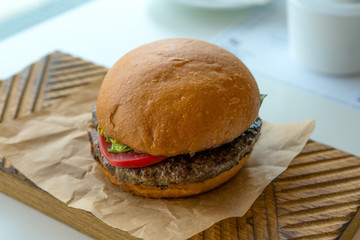 small hamburger on a wooden base