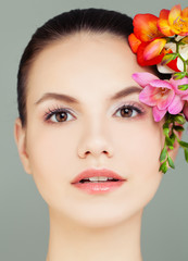 Fototapeta na wymiar Spa Woman Face with Flowers