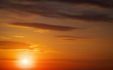 Beautiful fiery orange sunset sky as background