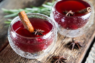 Refreshing cherry fruit drink with cinnamon and badan © Ruslan Mitin