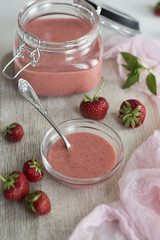 glass jar with homemade Strawberry Kurd