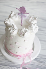 Fototapeta na wymiar Children's pink cake. birthday pink cake. Tiered birthday cake.
