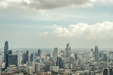 Fototapeta na wymiar Bangkok cityscape skyline which is metropolis & favorite city of tourists around the world. The city located between modern building skyscraper,from baiyok sky tower.