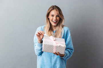 Portrait of a smiling young blonde girl