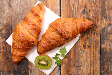 croissant on wood background