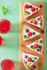 watermelon pizza slices with yogurt and berries, summer dessert