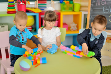 Fototapeta premium Children play in the children's room