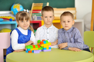Fototapeta premium Children play in the children's room