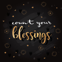 Golden stars and diamonds with lettering on chalkboard background
