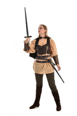full length portrait of girl wearing brown medieval costume,. standing pose, isolated on white studio background.