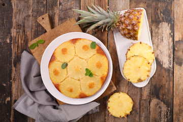 pineapple cake on wood background
