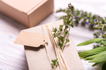 Gift box decorated with thyme branch