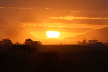 Obraz premium Sunset over the mountains