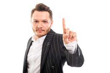 Portrait of business man showing number one.