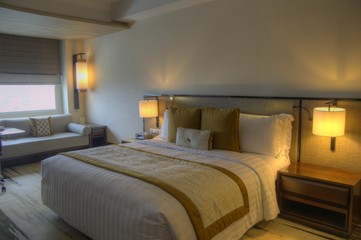 beautiful luxurious bedroom, condominium, apartment with double bed and pillow