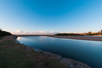 Water lagoon with clear blue sky at Narrabeen, NSW, Australia.