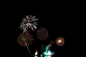 Amazing beautiful colorful fireworks light display on celebration up the sky night.