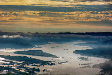 Fototapeta premium Forests, mountains, fog and golden cloudy sky are landscape in Thailand.