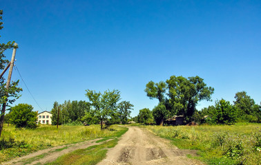 Country road against the blue sky