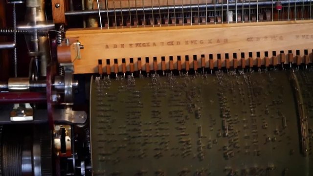 Old playing machine. Mechanical barrel organ.
